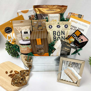 Gift basket of gourmet food items Easter bunny ornament on a table | Vancouver Gift Baskets for Thanksgiving and Fall