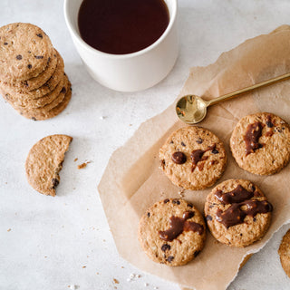Batch of chocolate cookies on parchment paper Easter bunny ornament on a table | Vancouver Gift Baskets - Chocolate and Sweet Treats