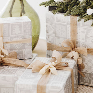 Wrapped gifts under a tree Easter bunny ornament on a table | Vancouver Gift Baskets for Christmas & Holiday
